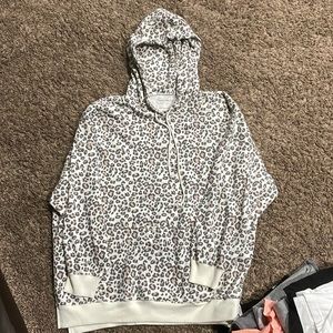 American Eagle Women’s Cheetah Print Hoodie with front pocket. Size L